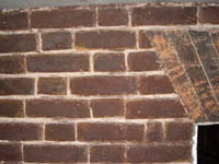decayed brick, prior to repair